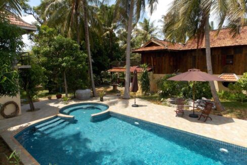 Wooden House for Sale in Kep with Pool, Garden & Guest Facilities – Ideal Investment